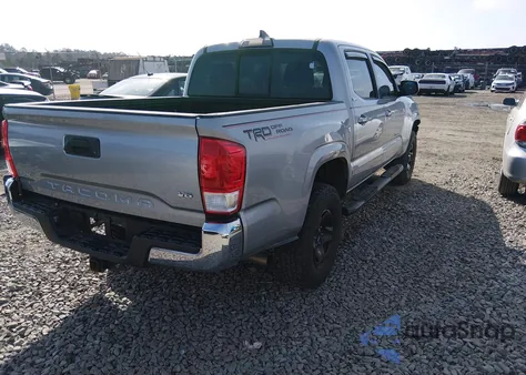 2016 Toyota Tacoma Sr5 V6 z USA, uszkodzony, nr VIN 3TMAZ5CN9GM013772